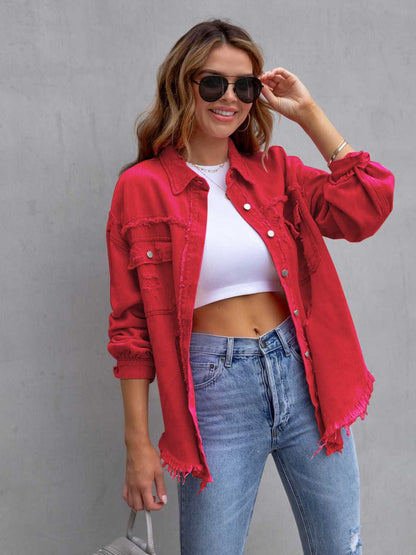 Fuchsia pink distressed drop shoulder denim jacket by Trendsi, featuring a casual, oversized fit and frayed details.