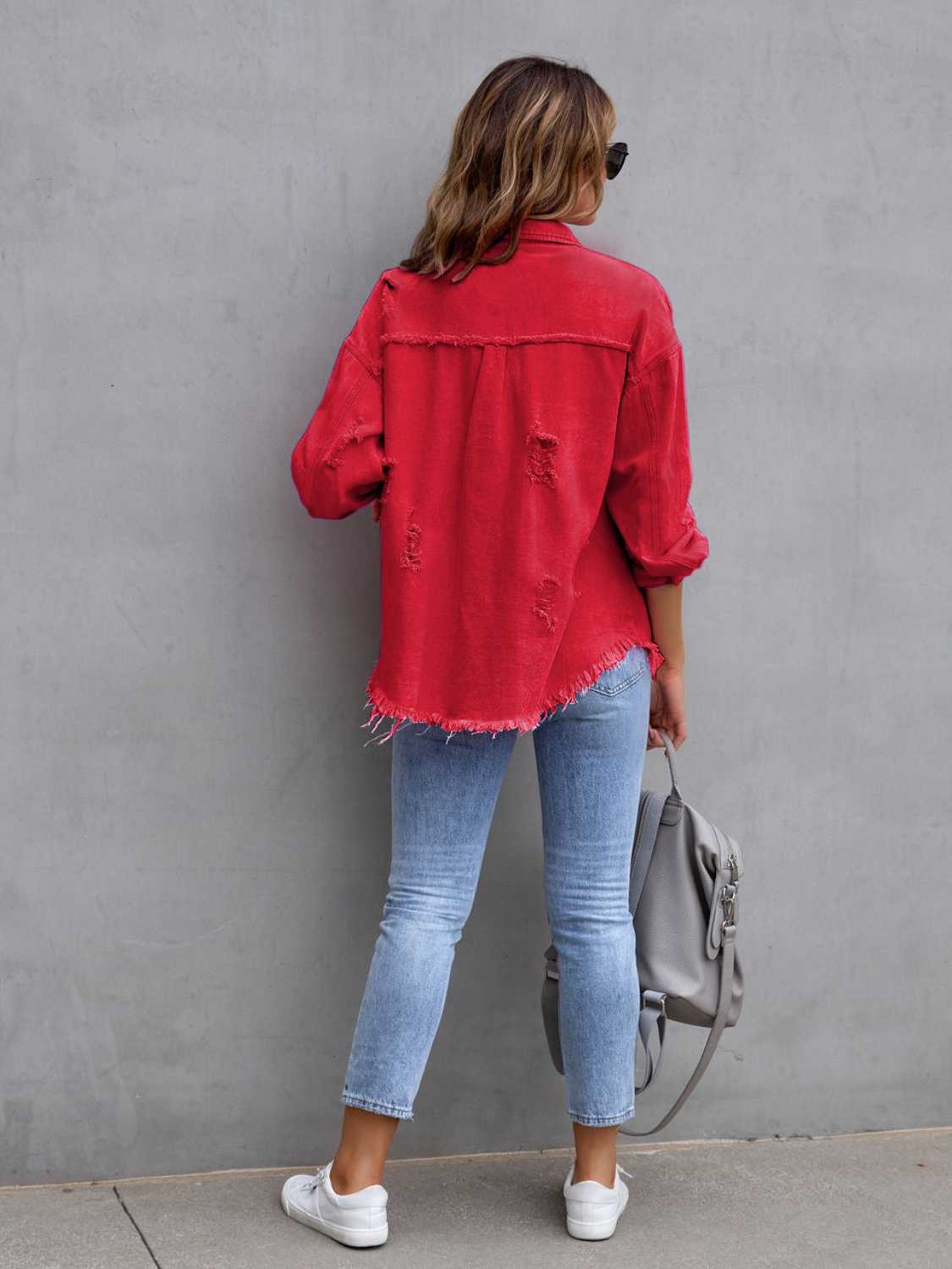 Fuchsia pink distressed drop shoulder denim jacket by Trendsi with frayed edges and casual fit, styled on a mannequin.