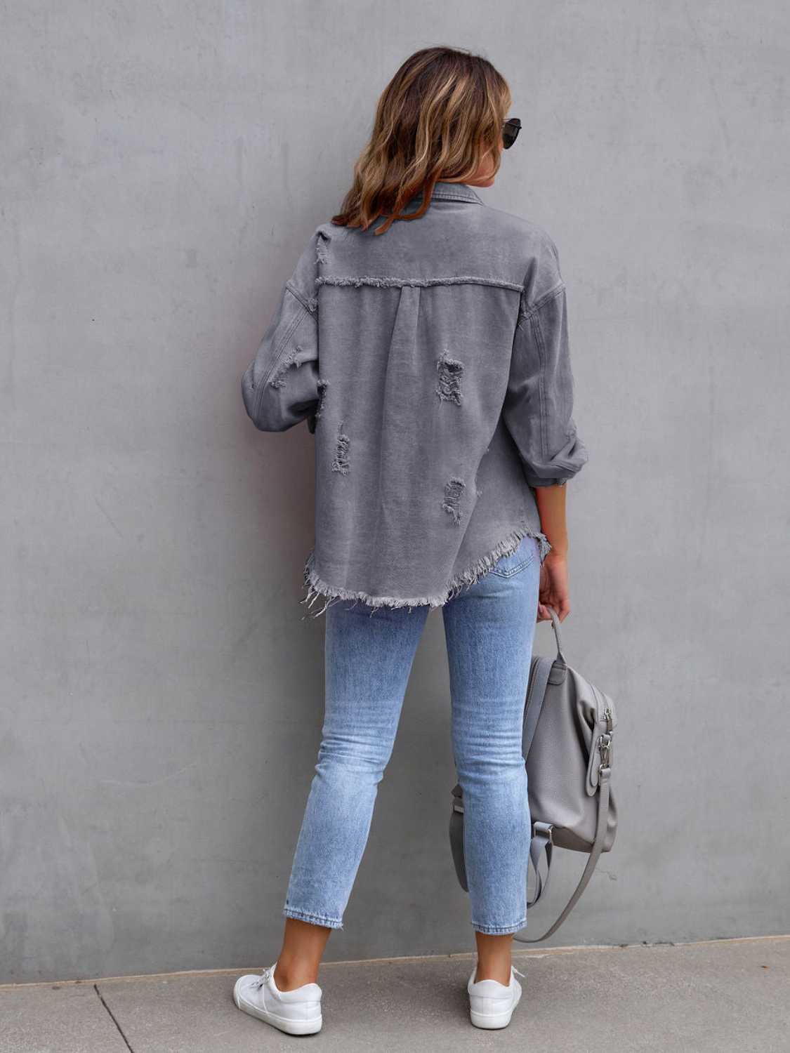 Fuchsia pink distressed drop shoulder denim jacket by Trendsi, featuring a casual fit and frayed details.