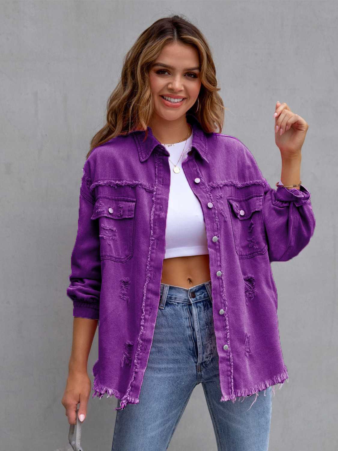 Fuchsia pink distressed drop shoulder denim jacket by Trendsi with frayed edges and a relaxed fit, casual streetwear style.