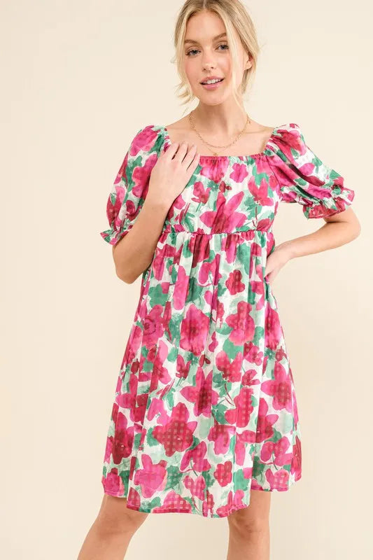 Fuchsia floral mini dress by Trendsi with smocked bodice and ruffle short sleeves, perfect for warm weather.