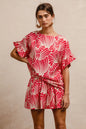 Fuchsia BiBi print woven ruffled sleeves top by Trendsi, featuring a stylish design with ruffled sleeve details.