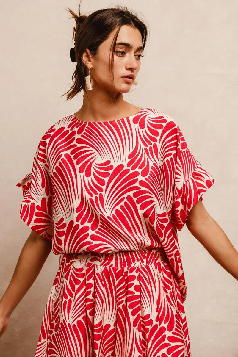 Fuchsia BiBi Print woven top by Trendsi with ruffled sleeves, lightweight fabric, and a stylish, casual design.