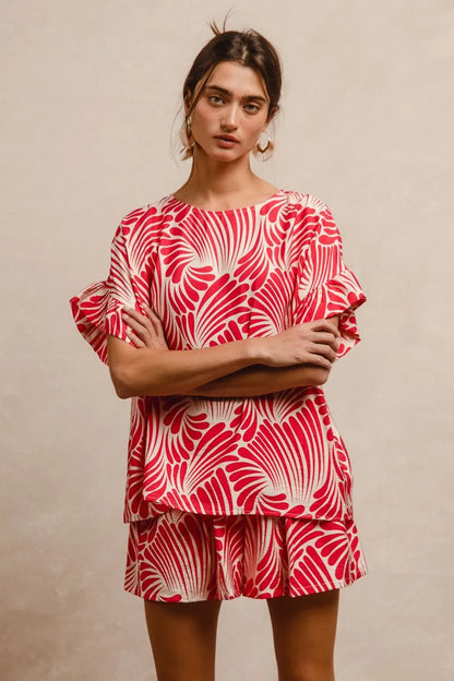 Fuchsia BiBi print woven top with ruffled sleeves, casual women's blouse from Trendsi, featuring vibrant pattern and lightweight fabric.