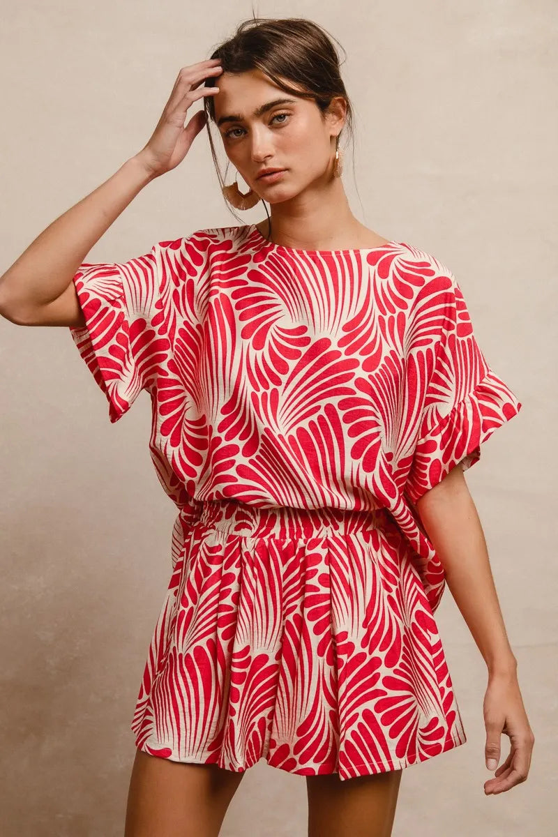 Fuchsia BiBi Print woven top with ruffled sleeves, stylish and lightweight, perfect for casual or trendy outfits.