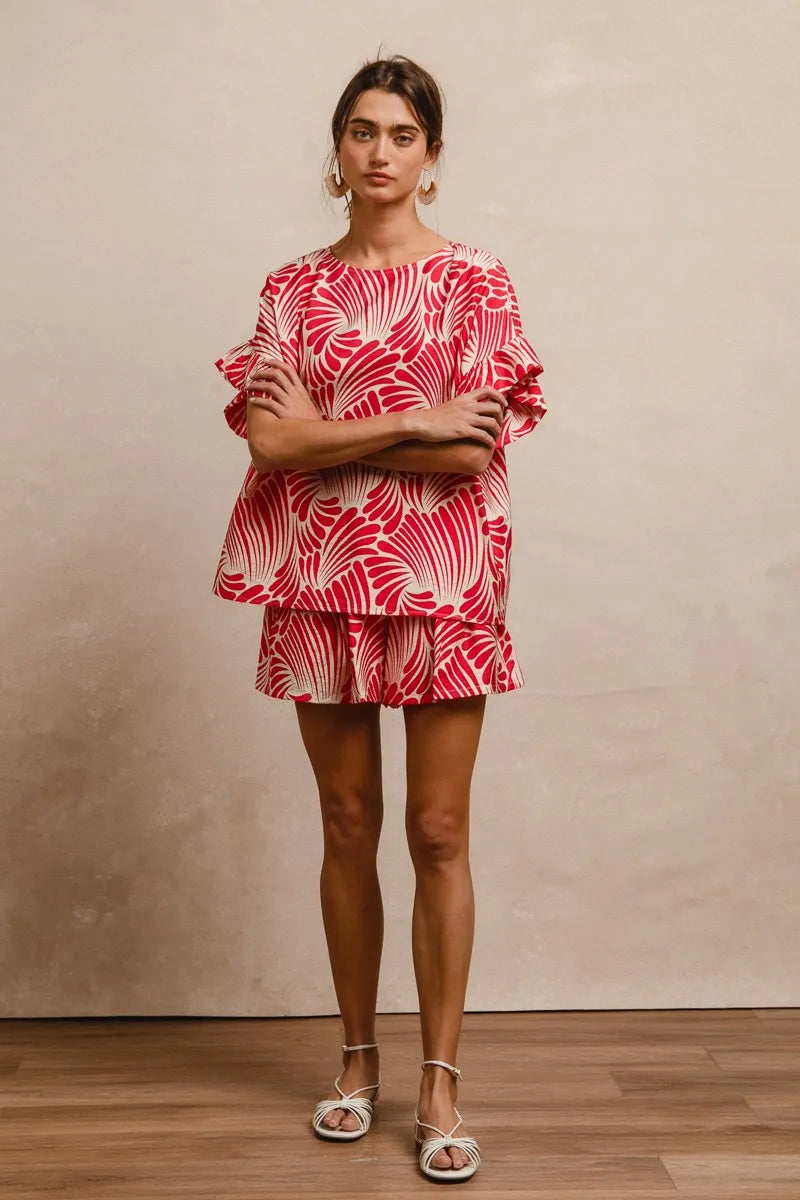 Fuchsia BiBi Print woven top by Trendsi with ruffled sleeves, lightweight fabric, and a stylish, casual fit.