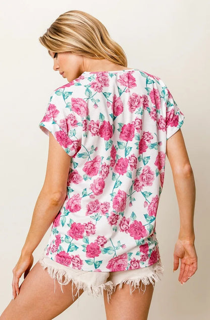 Fuchsia BiBi Rose printed poly span top with crochet lace trim, stylish women's blouse by Trendsi.
