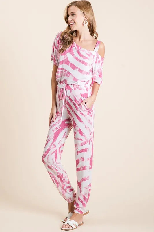 Fuchsia zebra print French terry top and pants set by Trendsi, casual loungewear with bold animal print and comfortable fabric.