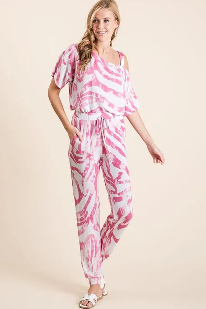 Fuchsia BiBi zebra print French terry top and pants set by Trendsi, soft comfortable loungewear with bold pattern.