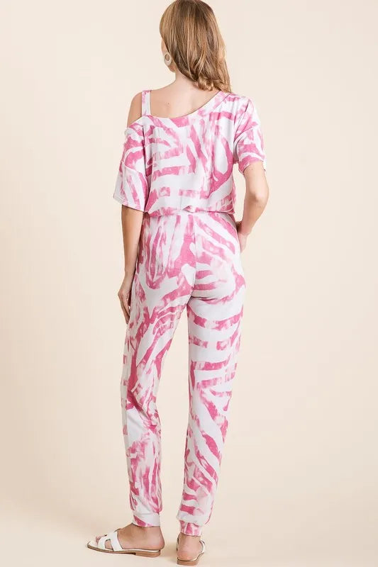BiBi zebra print French terry top and pants set by Trendsi, featuring a vibrant zebra pattern and comfortable casual fit.