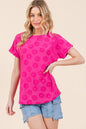 Fuchsia BOMBOM textured floral pattern short sleeve T-shirt by Trendsi, showcasing vibrant floral design and soft fabric.