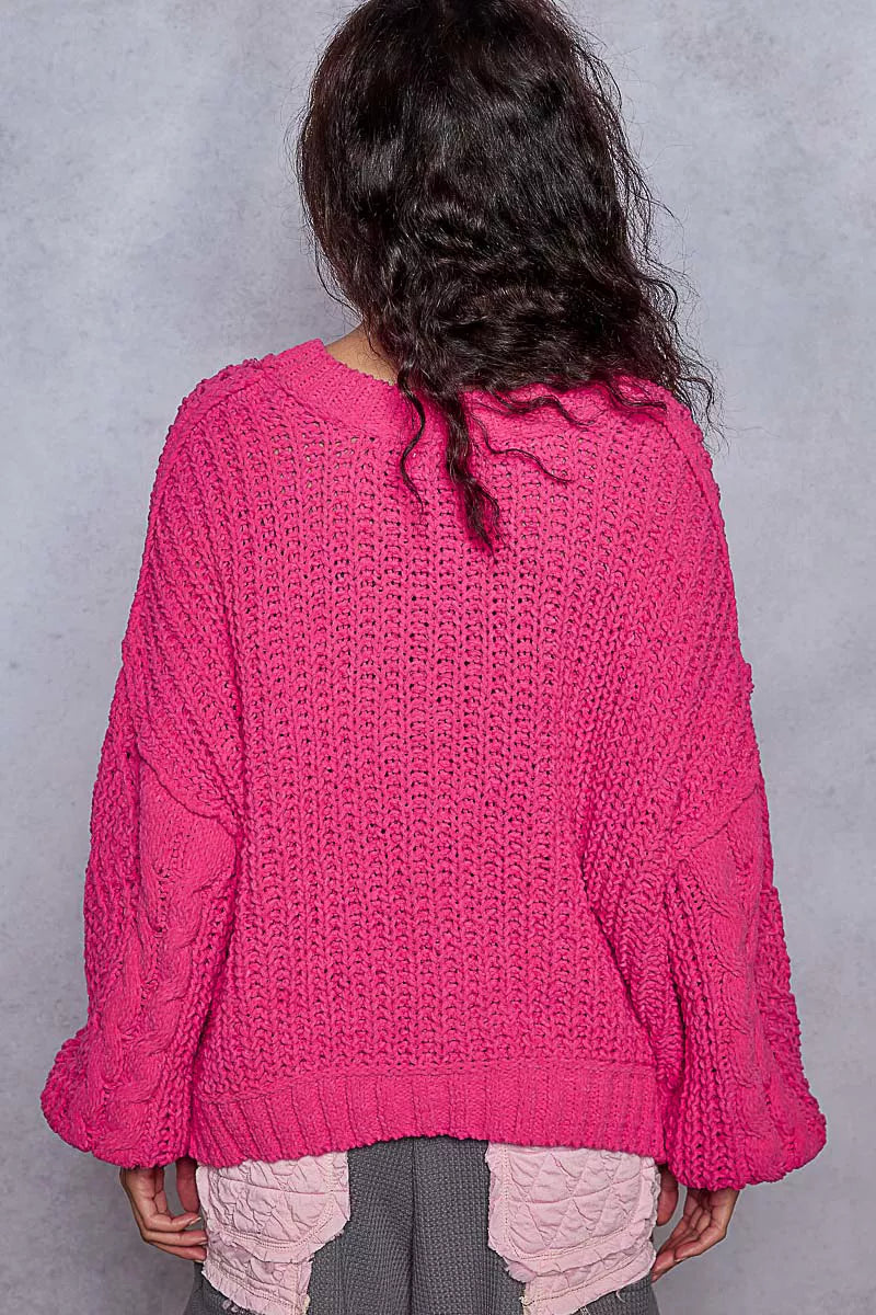Fuchsia POL Cable-Knit Solid V-Neck Cropped Sweater by Trendsi, front view showing cable knit texture and V-neck design.