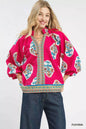 Fuchsia Umgee boho floral print tunic blouse with long sleeves and relaxed fit, featuring vibrant floral patterns.