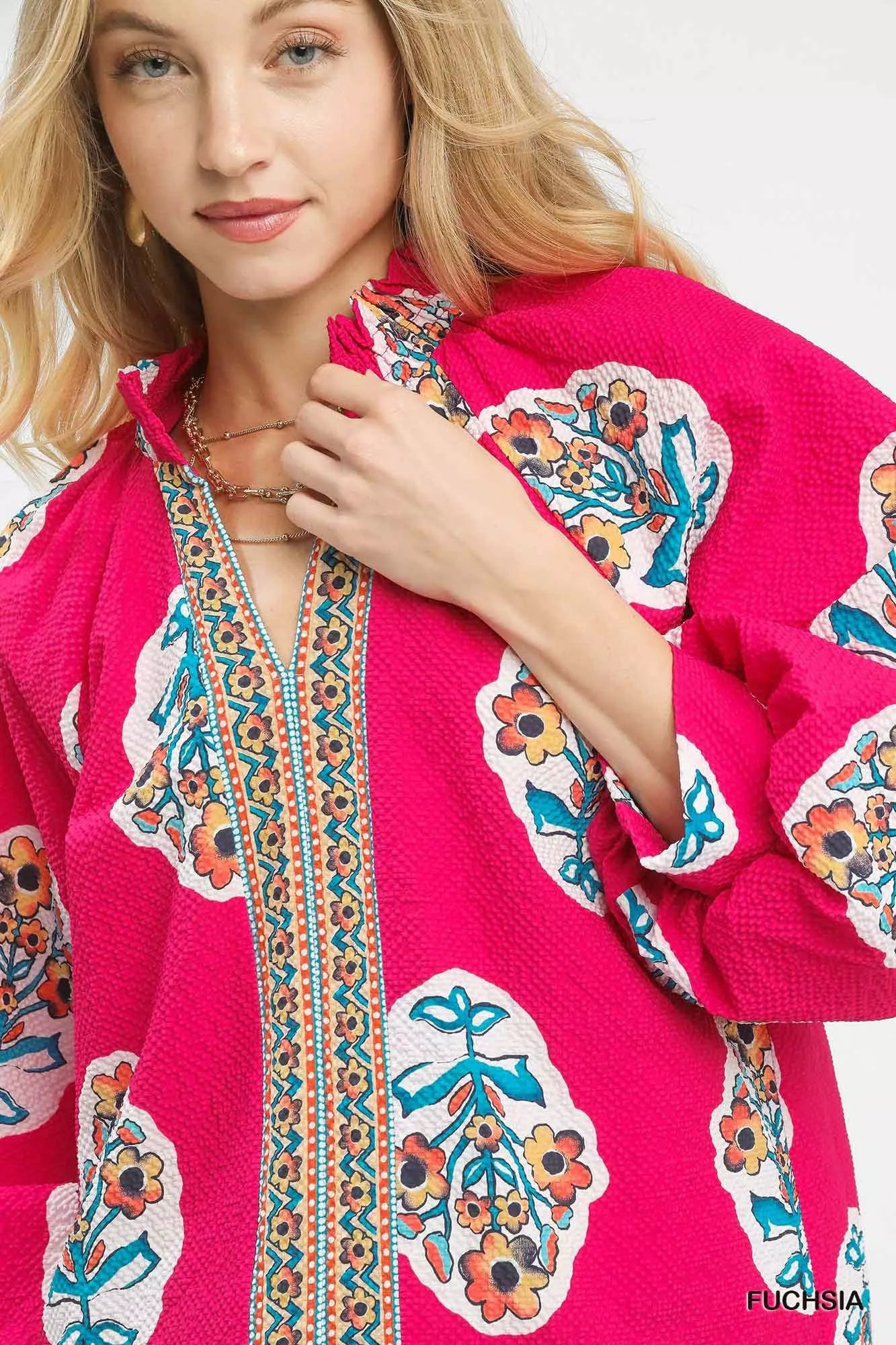 Fuchsia Umgee boho floral print tunic blouse with long sleeves and relaxed fit, stylish casual top for women.