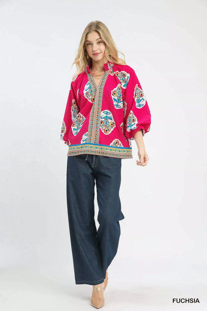 Fuchsia Umgee boho floral print tunic blouse with long sleeves and relaxed fit, stylish for casual or bohemian outfits.