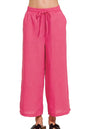Fuchsia Zenana woven crepe cropped pants with elastic waistband and band waist, styled for a casual, fashionable look.