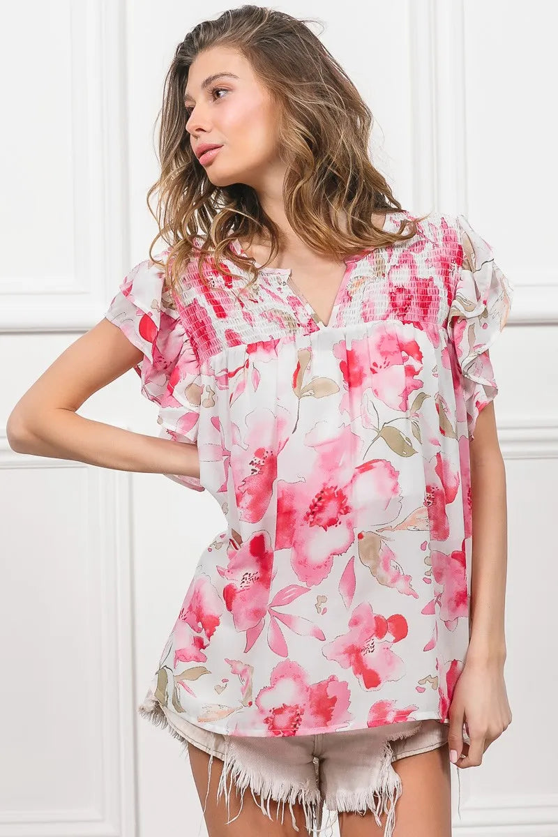 Fuchsia and white floral print flutter sheer top by Trendsi, featuring lightweight, flowy fabric and feminine design.