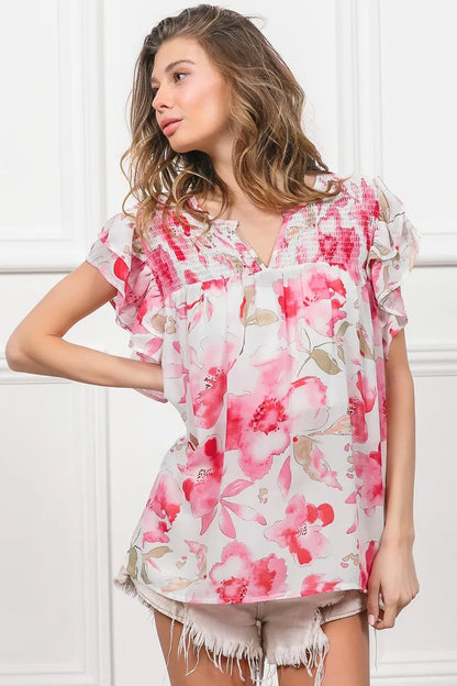 Fuchsia and white floral print flutter sheer top by Trendsi, featuring lightweight, flowy fabric and feminine design.