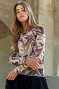 Marble design long sleeve mesh top by J.NNA featuring galaxy-inspired marble pattern and sheer fabric, trendy and stylish.
