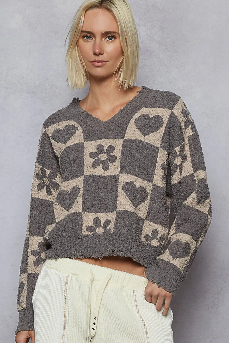 Grey and beige V-neck checkered sweater with heart pattern from Trendsi, featuring a cozy knit design.