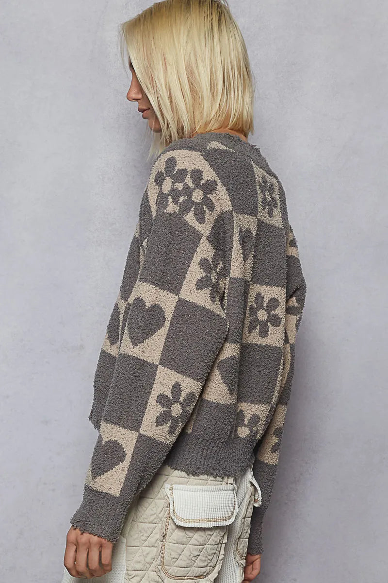 Grey and beige checkered V-neck sweater with heart pattern from Trendsi, featuring a cozy, stylish knit design.