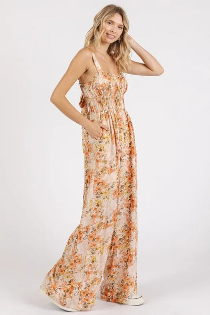 Flower print sleeveless jumpsuit with gathered bust detail from Mittoshop by Trendsi, shown on a model.