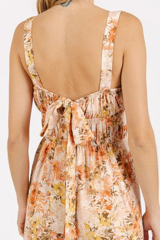 Flower print sleeveless jumpsuit with gathered bust by Mittoshop, featuring a stylish and comfortable design.