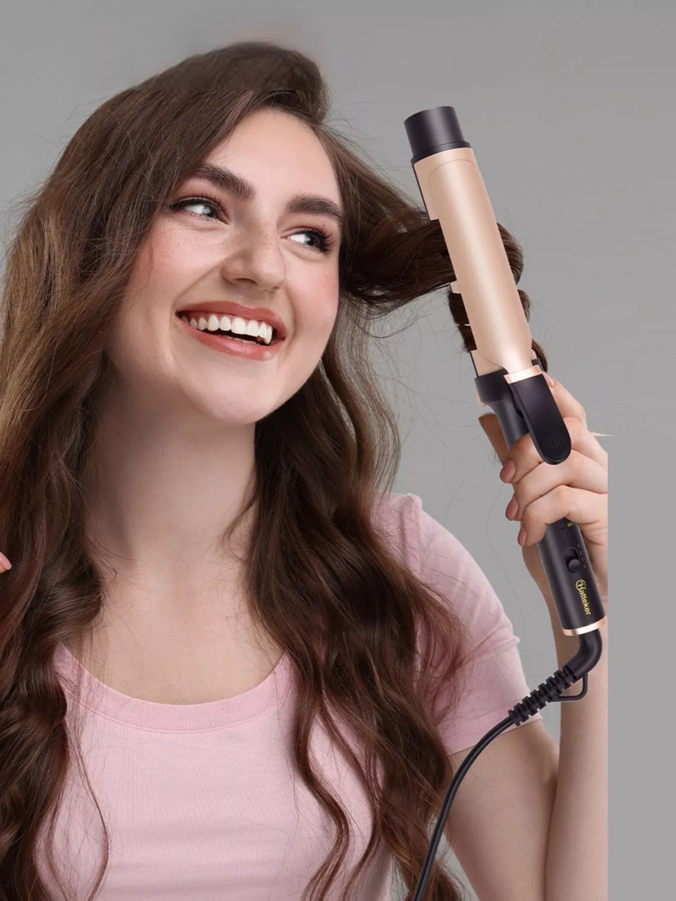 Trendsi adjustable temperature gold curling iron with European plug and ergonomic handle for versatile styling.
