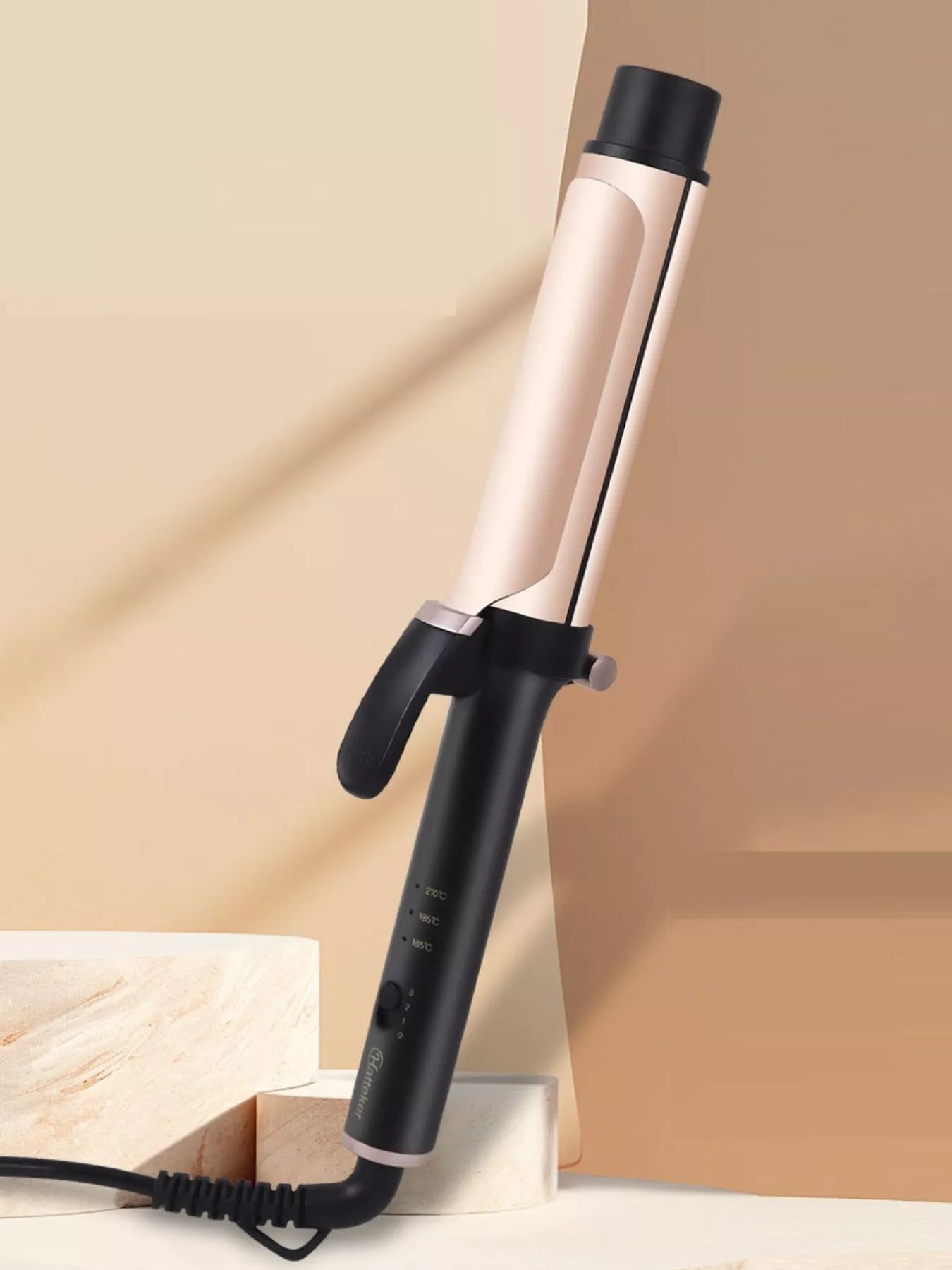 Gold adjustable temperature curling iron with European plug, Trendsi, featuring a sleek design for versatile hair styling.