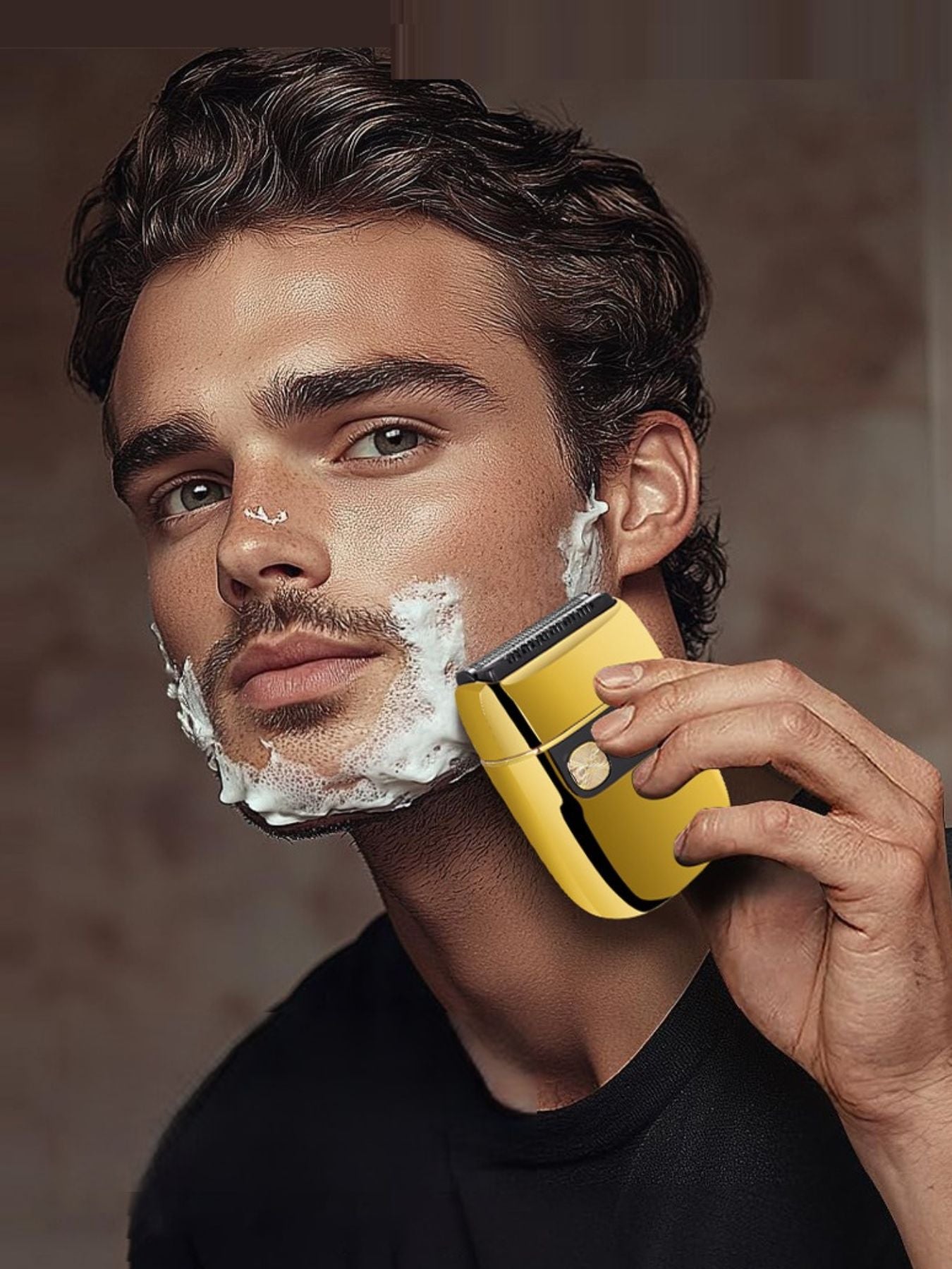Gold portable mini electric shaver by Trendsi with compact design for easy grooming on the go.