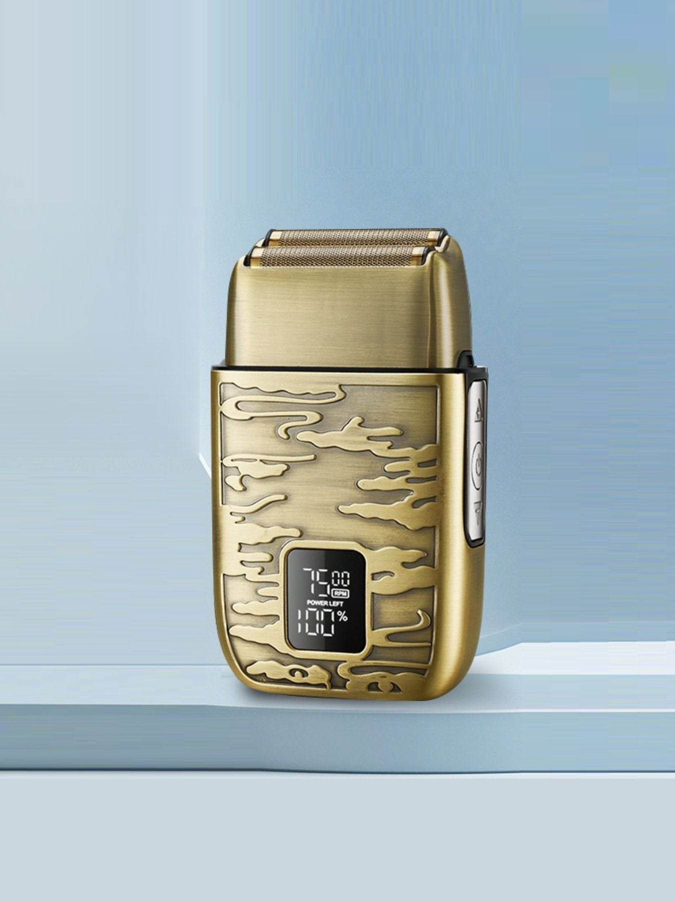 Gold electric foil shaver with LED display, Trendsi brand, showing close-up of the sleek shaving head and LED screen.