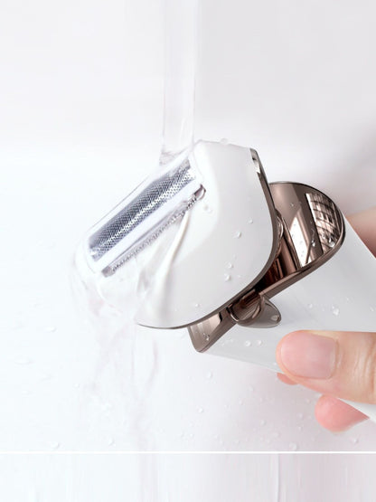 Gold Trendsi painless hair removal epilator with multiple attachments and ergonomic design for smooth skin.