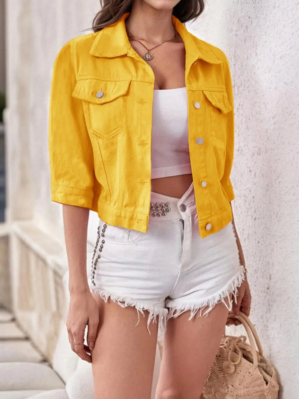Plus size cropped denim jacket by Trendsi, featuring classic blue denim, collar, button closure, and stylish fit.