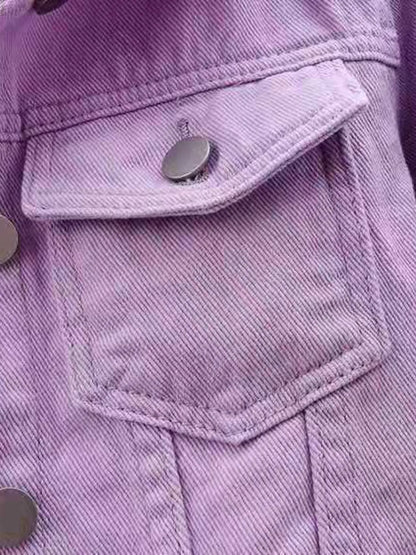 Plus size cropped denim jacket by Trendsi, featuring classic blue denim fabric and stylish short-length design.