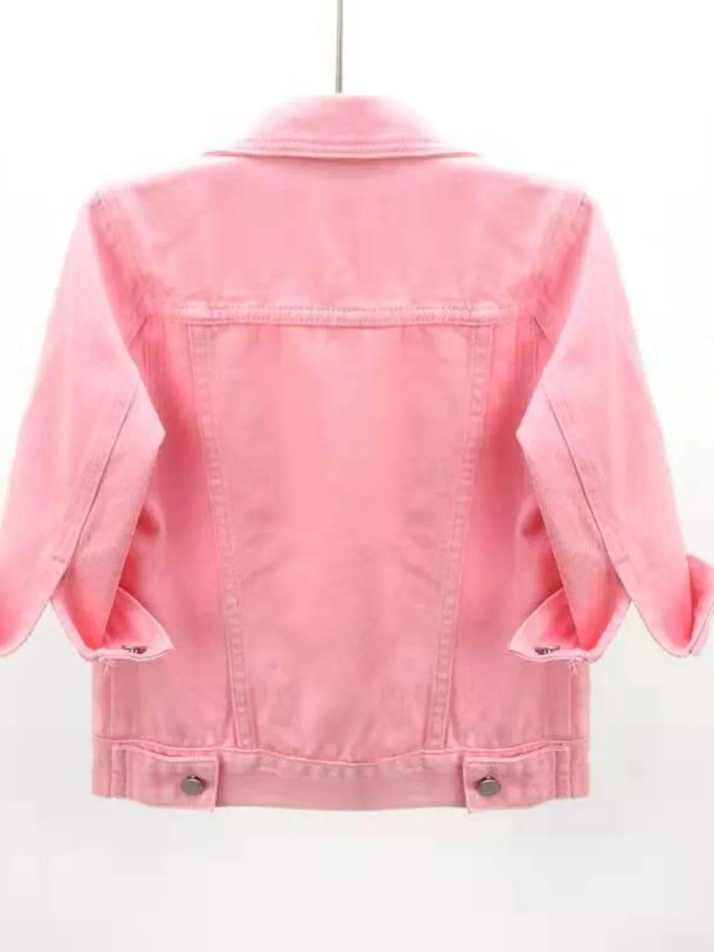 Plus size cropped denim jacket from Trendsi, featuring classic blue denim and a stylish, relaxed fit.