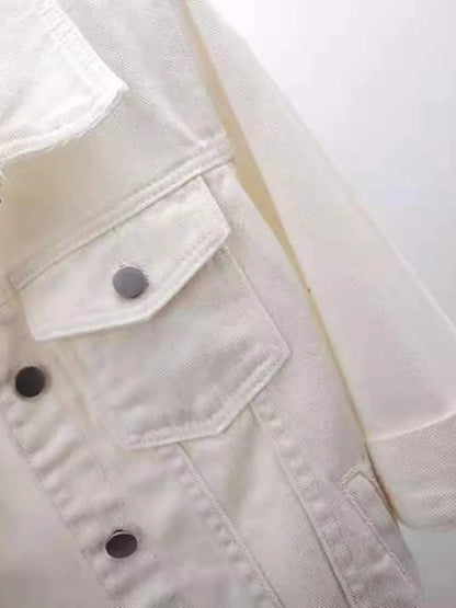 Plus size cropped denim jacket by Trendsi, featuring classic blue denim fabric and a stylish, tailored fit.