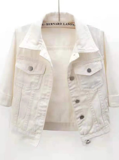 Plus size cropped denim jacket by Trendsi, featuring classic blue denim with a fitted, stylish design and button front.