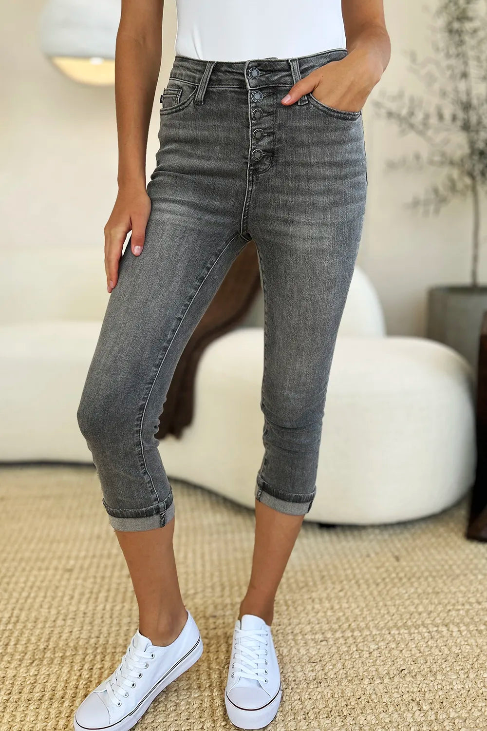 Gray Judy Blue full-size high-waist cuffed capris with button fly and rolled cuffs, showcasing a stylish denim look.