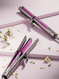 Trendsi adjustable temperature hair straightener and curler with gray finish, European plug for versatile styling.