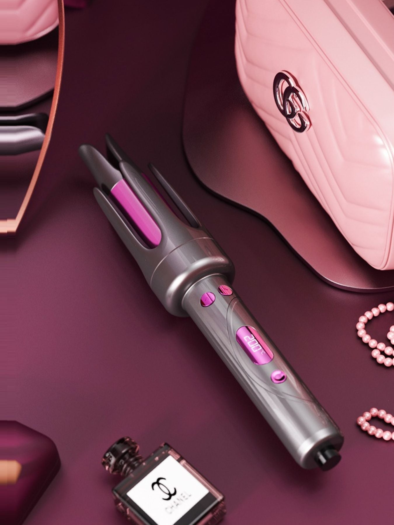 Gray automatic curling iron by Trendsi with European plug, featuring a sleek design for easy, quick curls.