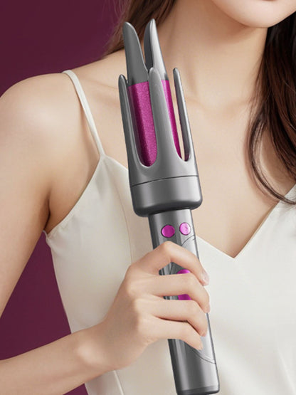 Gray automatic curling iron by Trendsi with European plug, showcasing its sleek design and curling barrel.