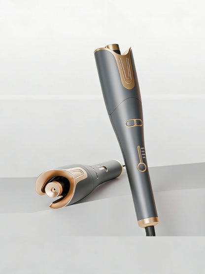 Gray automatic rotating hair curling iron by Trendsi with European plug, showcasing its sleek design and rotating barrel for curls.