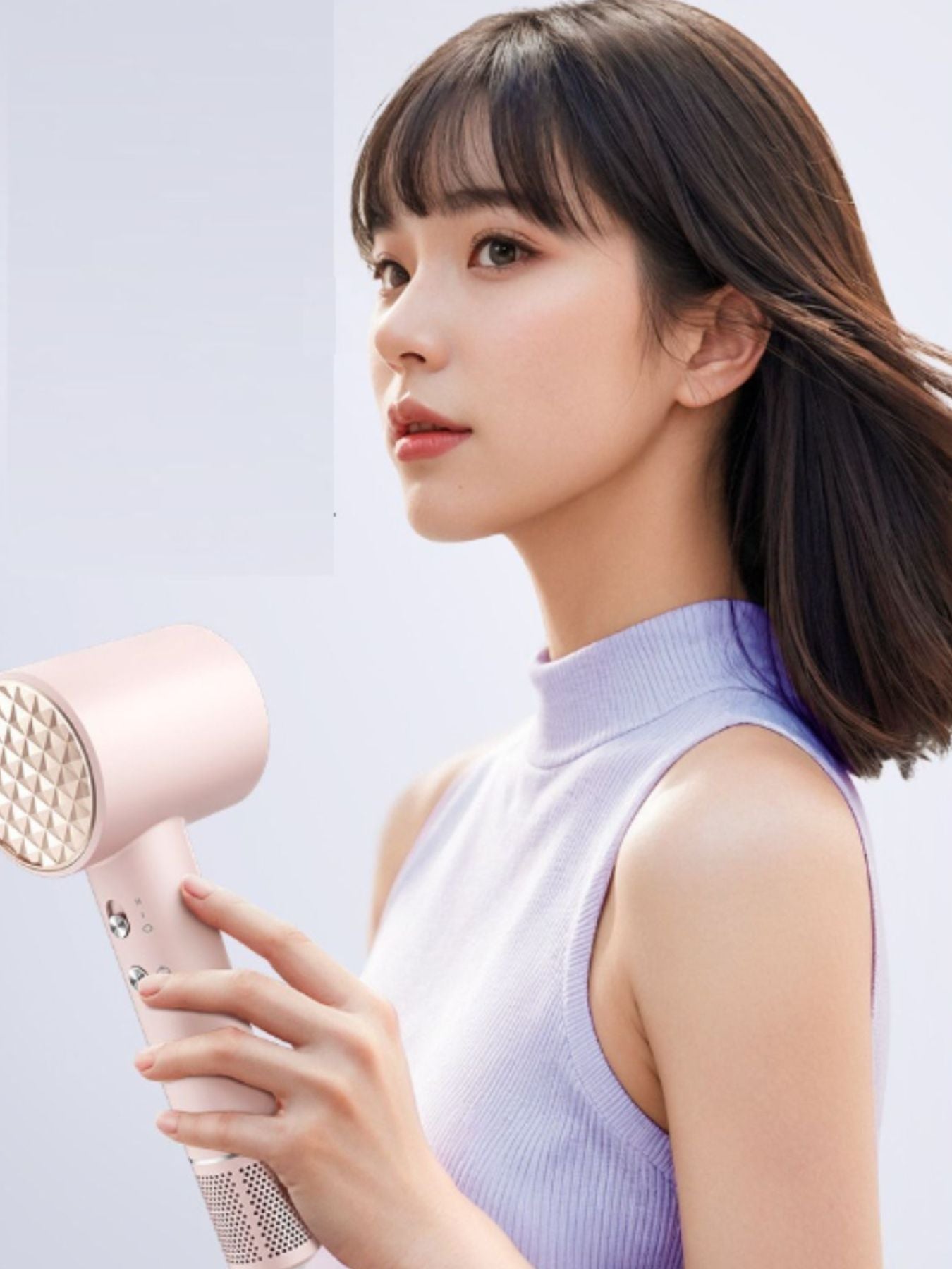 Gray lightweight high-speed hair dryer by Trendsi with European plug, compact and powerful for quick drying.