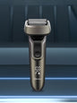 Gray electric shaver with LED display from Trendsi, showing close-up of shaving head and sleek design.