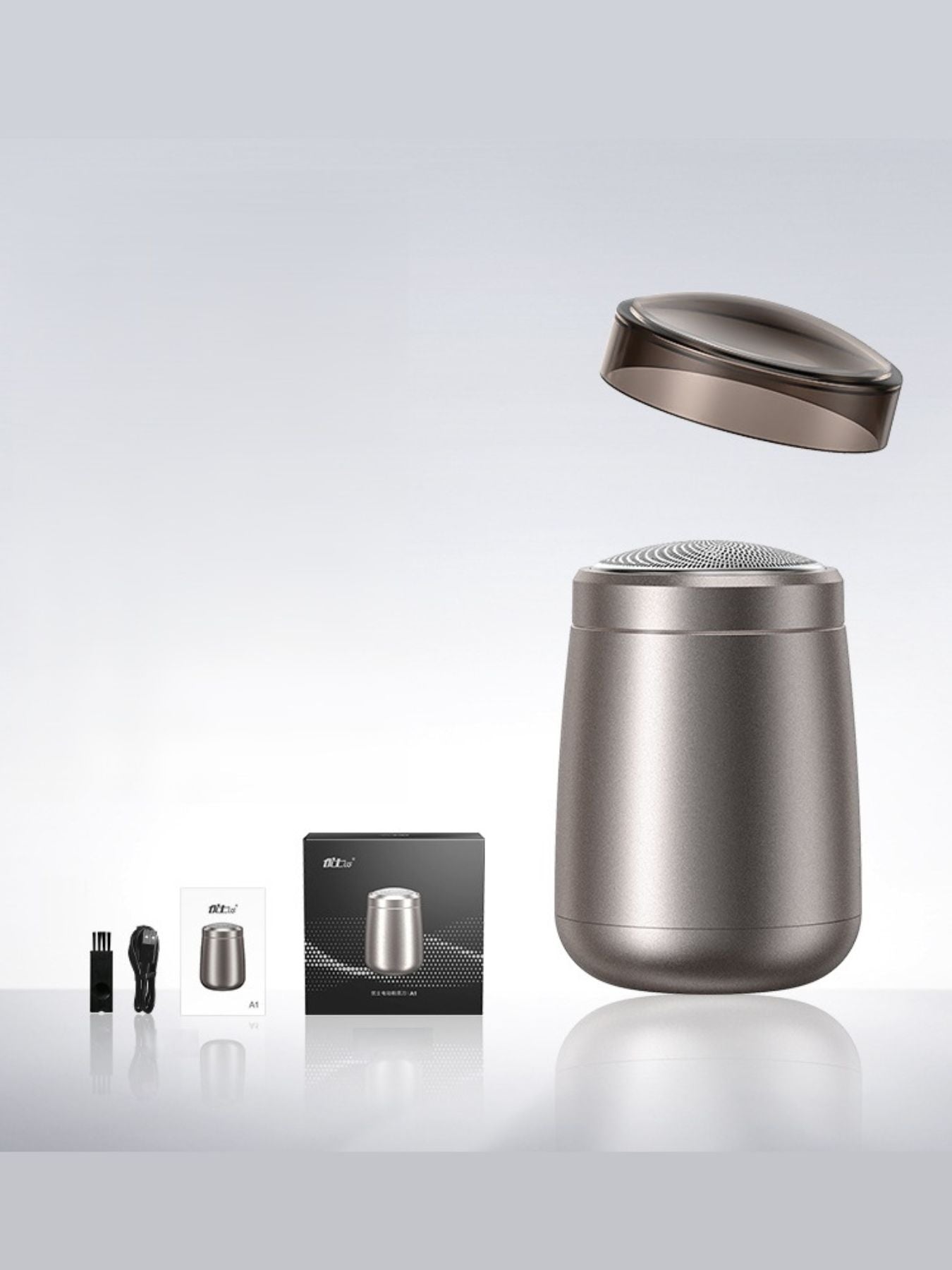 Gray portable mini electric shaver from Trendsi, compact and lightweight design for convenient grooming on the go.