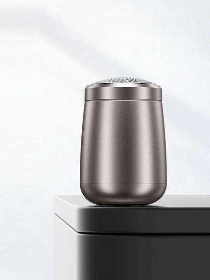 Gray portable mini electric shaver from Trendsi with compact design and one-size-fits-all functionality.