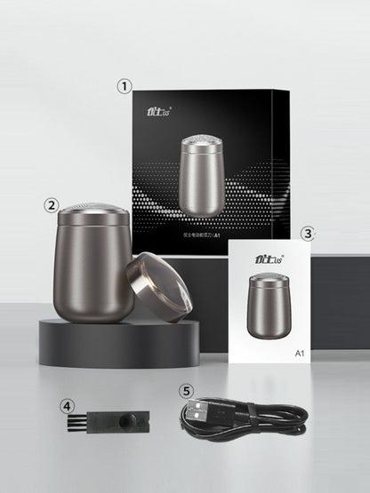 Gray portable mini electric shaver by Trendsi, compact handheld grooming device with foil blades for easy, on-the-go shaving.