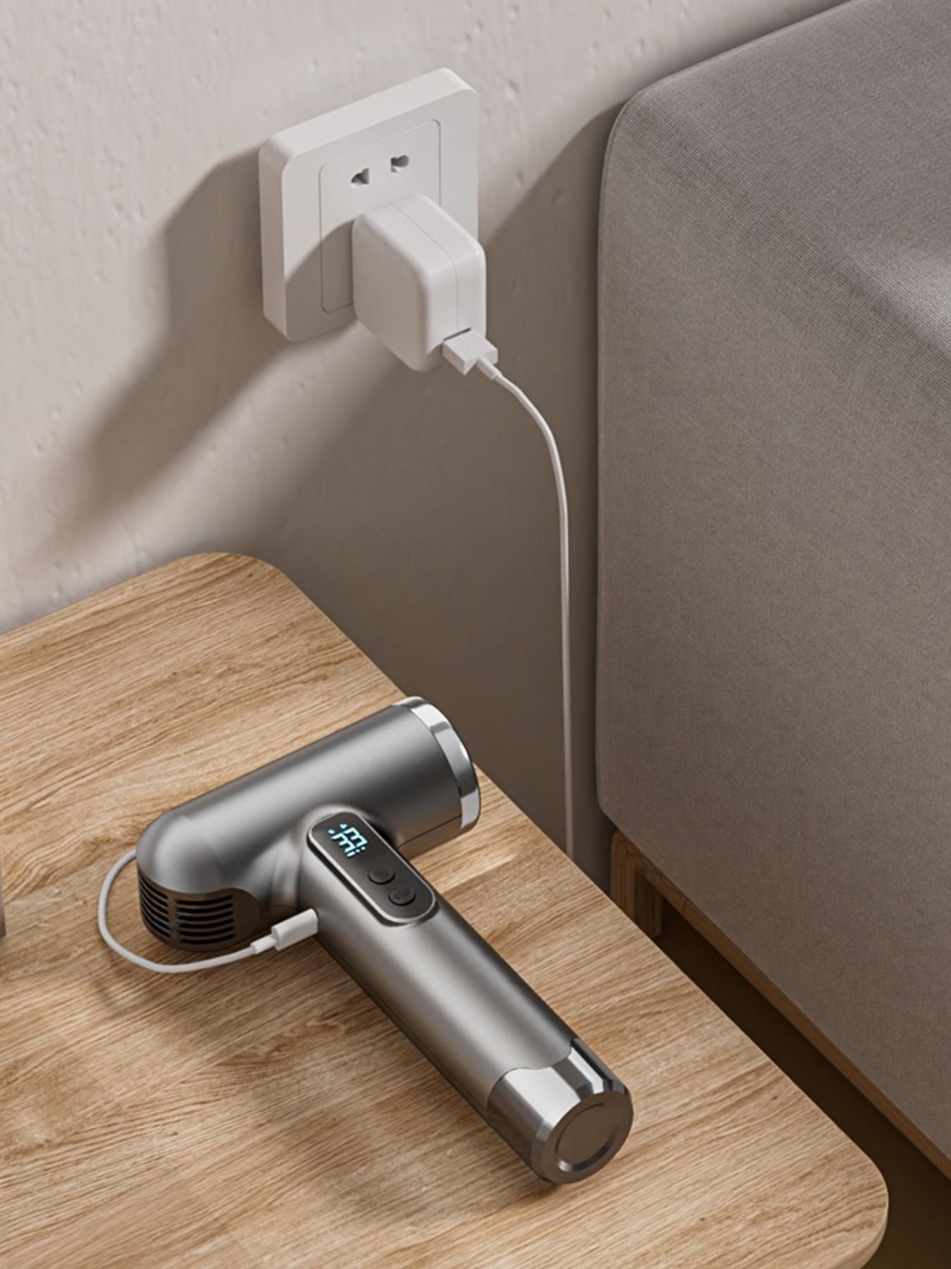 Gray portable rechargeable high-speed hair dryer by Trendsi, compact and lightweight for easy styling on the go.