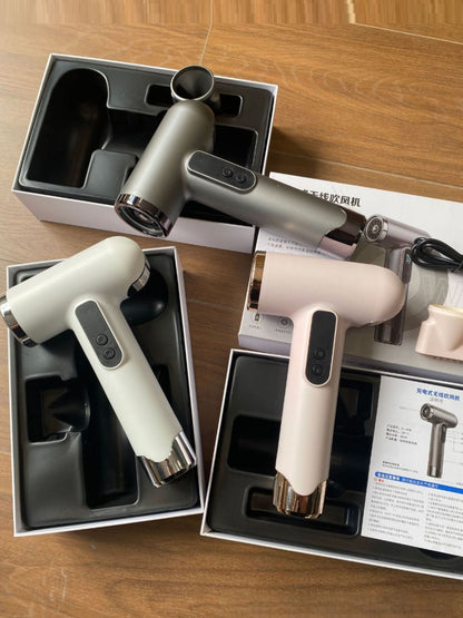 Gray portable rechargeable high-speed hair dryer from Trendsi, compact design with a sleek finish and foldable handle.