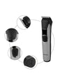 Gray electric hair clipper by Trendsi with a sleek design, suitable for professional or home haircutting.